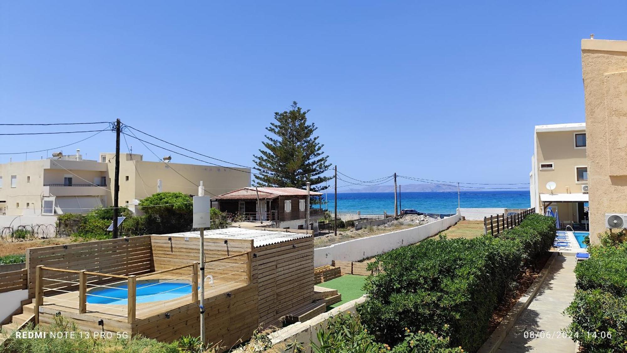 Kokkini Hani Niros Beachfront Aparthotel מראה חיצוני תמונה