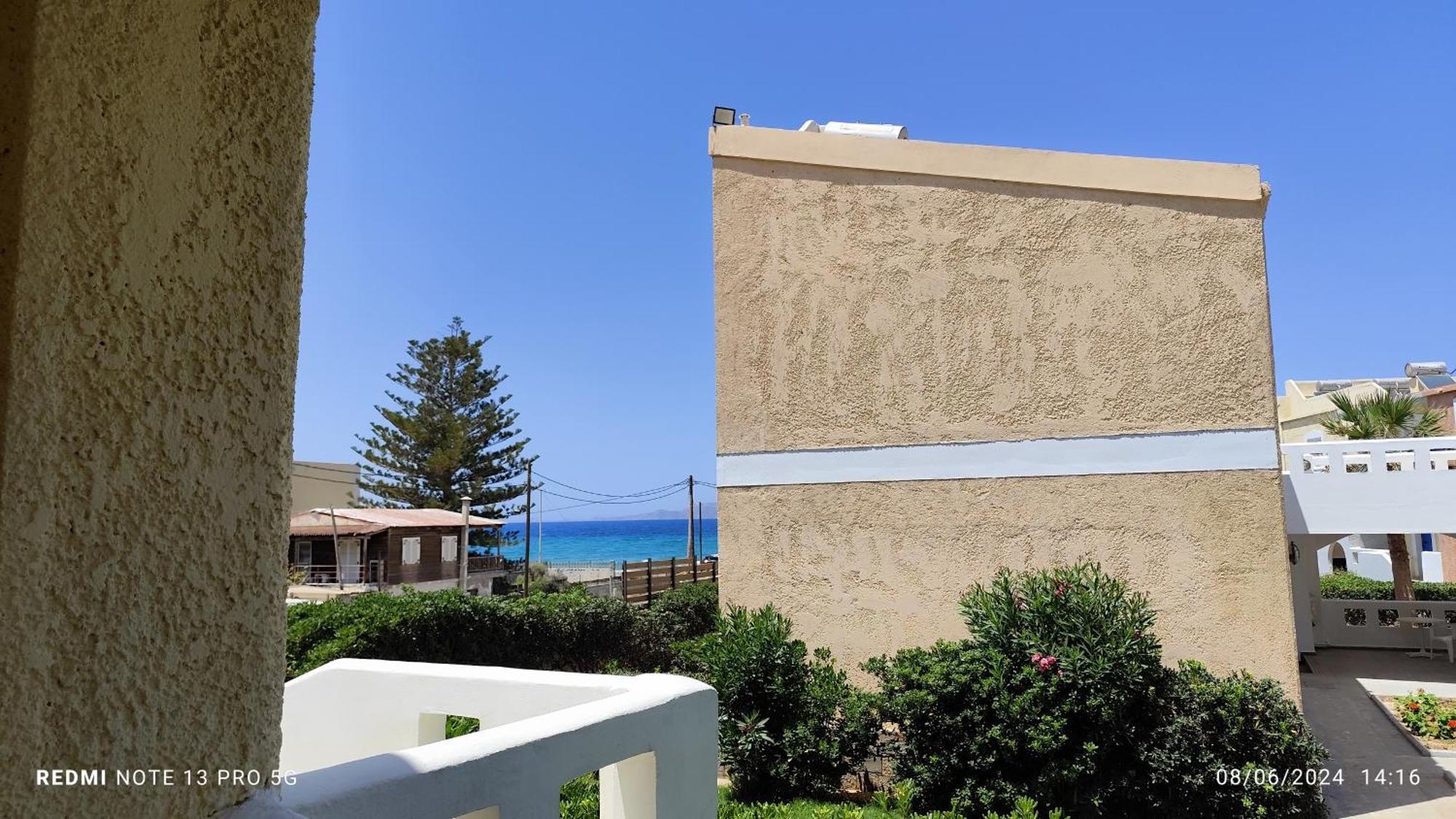 Kokkini Hani Niros Beachfront Aparthotel מראה חיצוני תמונה
