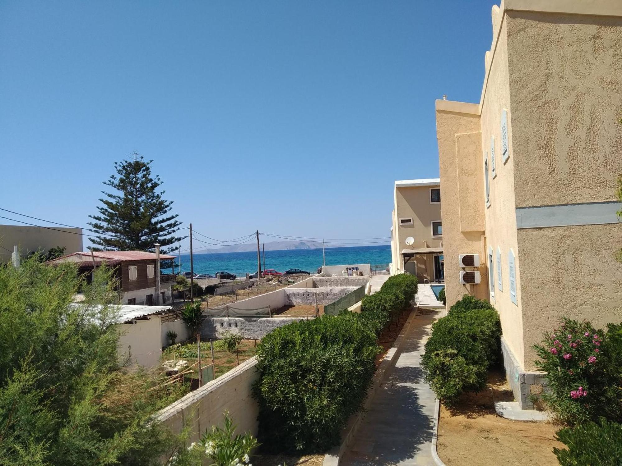 Kokkini Hani Niros Beachfront Aparthotel מראה חיצוני תמונה