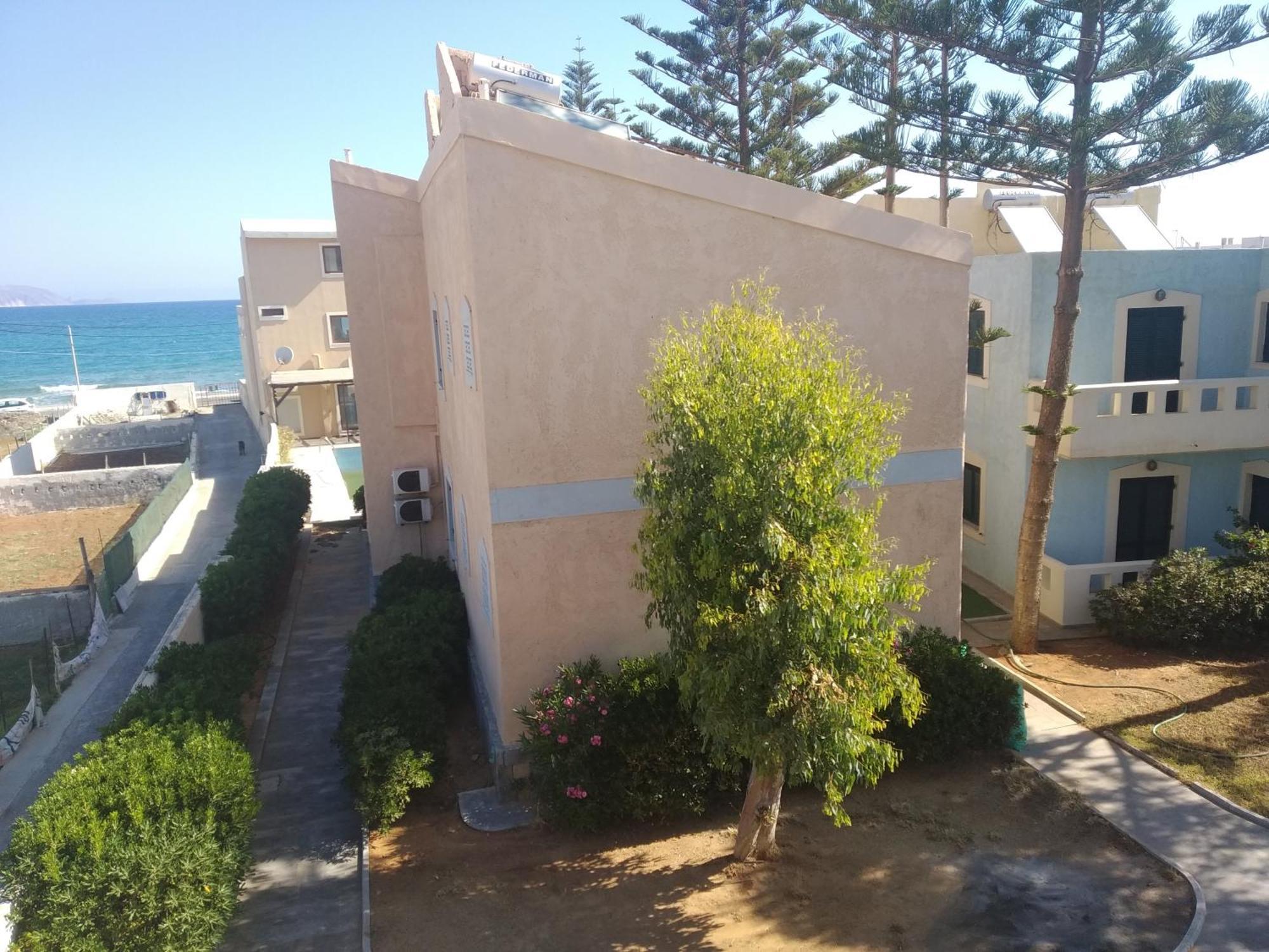 Kokkini Hani Niros Beachfront Aparthotel מראה חיצוני תמונה