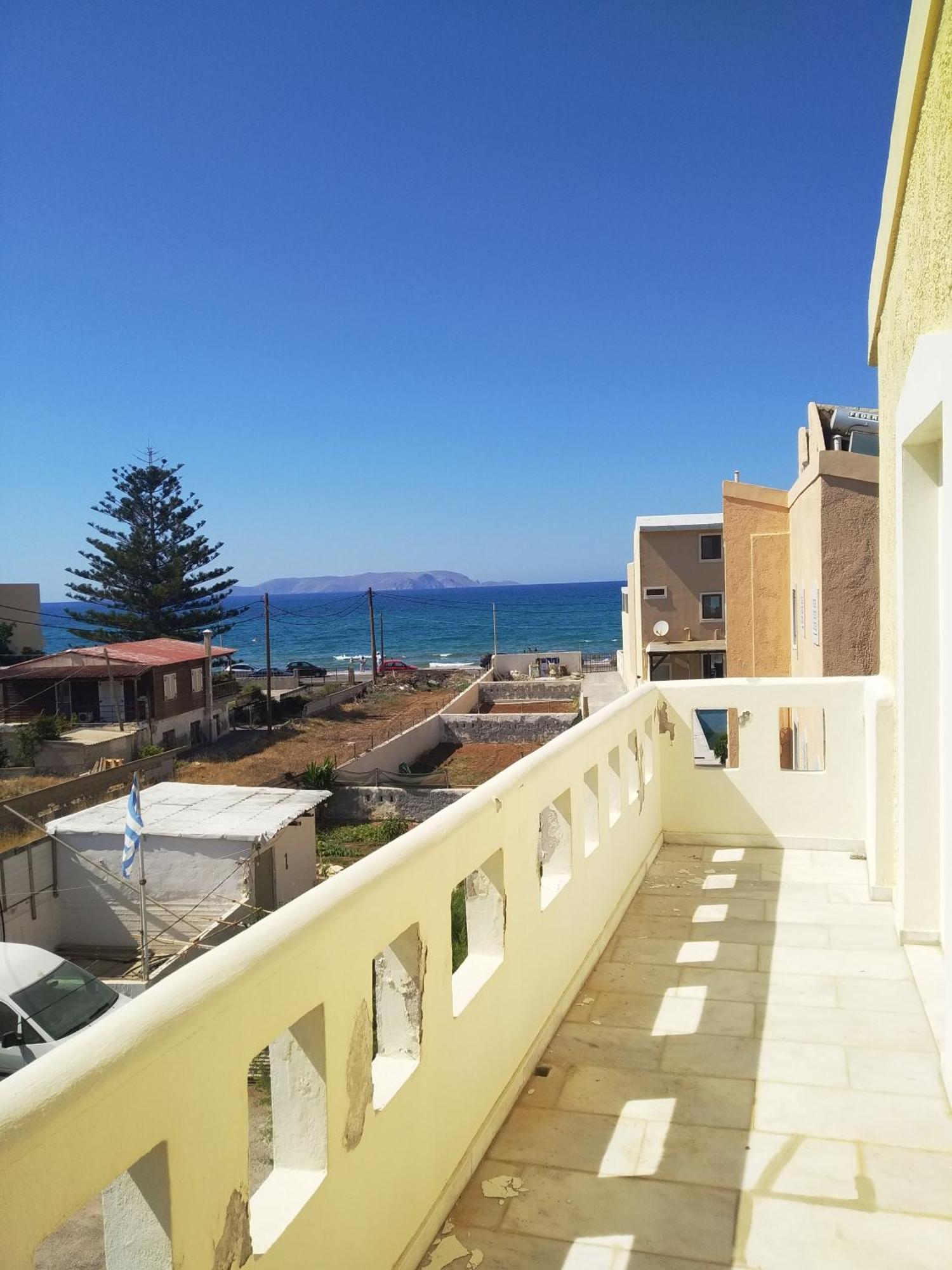 Kokkini Hani Niros Beachfront Aparthotel מראה חיצוני תמונה